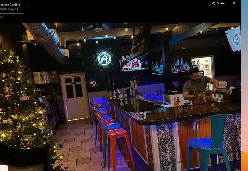 Turquoise and orange stools at the bar